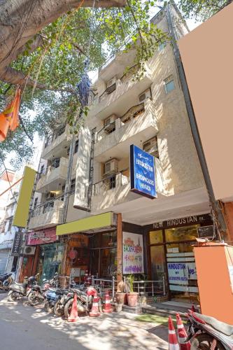 a building with motorcycles parked in front of it at Hindustan By Backpackers Heaven - Traveller's Choice Award 2025 Best of Best Winning Hotel in New Delhi