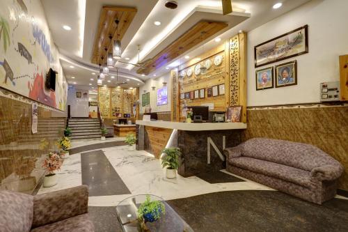 a lobby of a store with a table and a couch at Hindustan By Backpackers Heaven - Traveller's Choice Award 2025 Best of Best Winning Hotel in New Delhi
