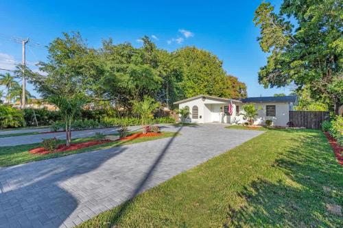 a driveway in front of a house at Bright and Cozy Home in Homestead in Homestead