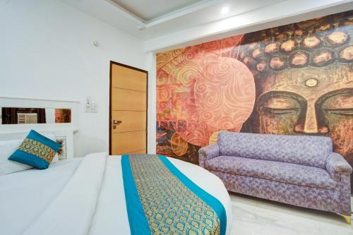 a bedroom with a bed and a large wall mural at Hindustan By Backpackers Heaven - Traveller's Choice Award 2025 Best of Best Winning Hotel in New Delhi