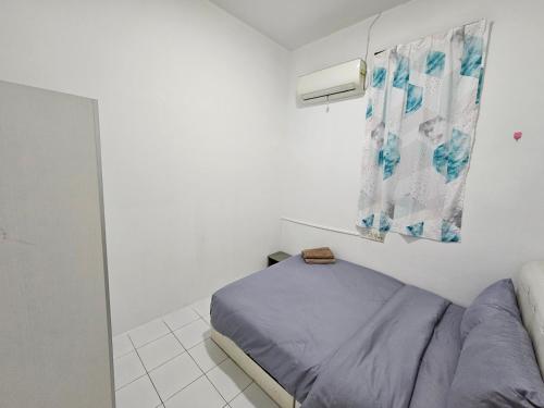 Postel nebo postele na pokoji v ubytování Sunny Point Hostel