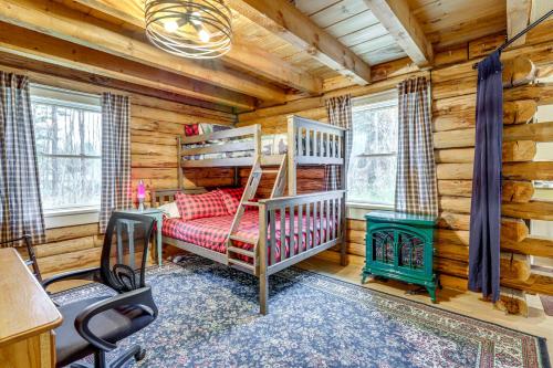 a log cabin bedroom with bunk beds and a desk at 3 Mi to UMass Amherst Peaceful New England Cabin in Sunderland