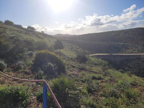 a winding road on the side of a hill at Casa de campo in Al Hoceïma