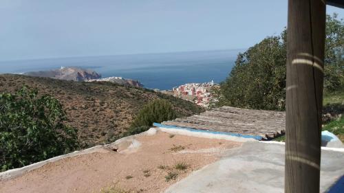 a view of the ocean from the top of a hill at Casa de campo in Al Hoceïma