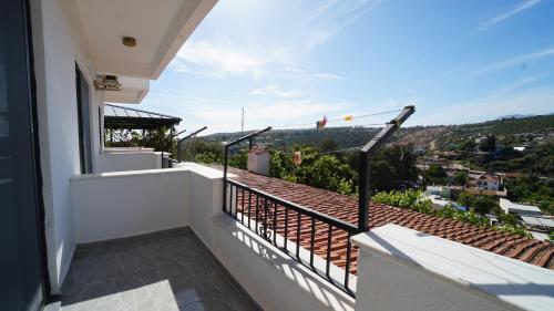 a balcony with a view of a city at Hotel Sema in Patara