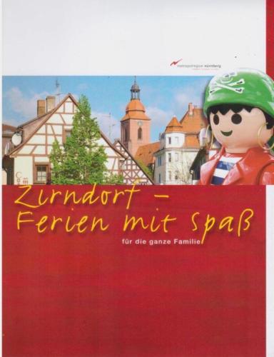 a sign for an urban nut spring with a toy at CineHotel Maroni in Zirndorf