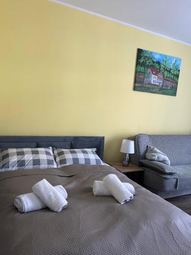 Ένα ή περισσότερα κρεβάτια σε δωμάτιο στο Apartament Salamandra Uno