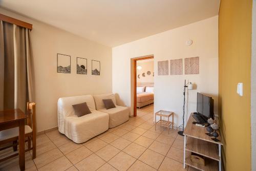 Postel nebo postele na pokoji v ubytování Mini Art Apartments