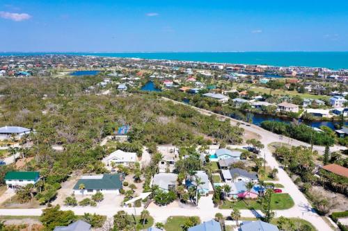 an aerial view of a resort with the ocean at Tipsy Turtle in Sanibel