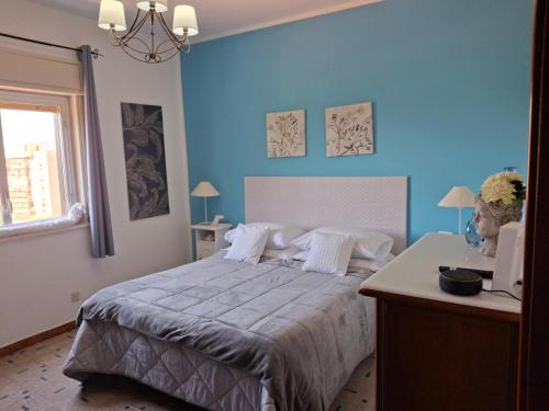 Ένα ή περισσότερα κρεβάτια σε δωμάτιο στο Ricky House