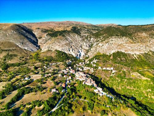 an aerial view of a village in a mountain at Casa Notte Stellata in Roccapreturo