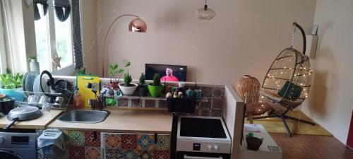 Dapur atau dapur kecil di Stylish and Cute Appartment