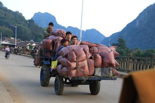 a group of people riding on the back of a truck at Cam u view Guest House in Nongkhiaw