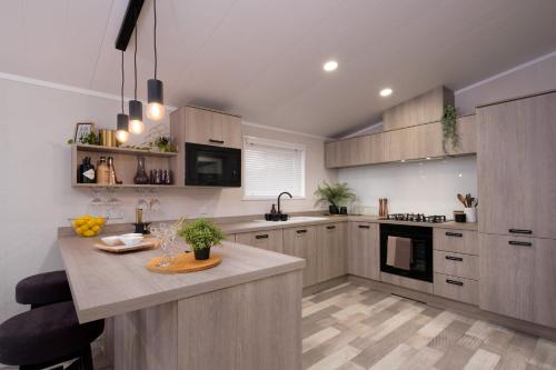 Kuchyň nebo kuchyňský kout v ubytování Crofthead Holiday Park