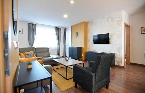 Μια τηλεόραση ή/και κέντρο ψυχαγωγίας στο ONE Luxury Grand Suite Eger
