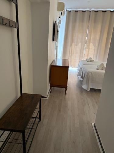 Ένα ή περισσότερα κρεβάτια σε δωμάτιο στο Nou Roser