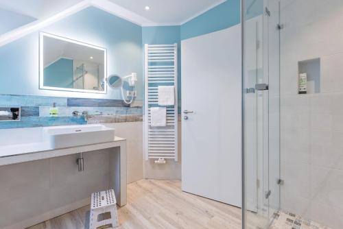 Koupelna v ubytování Best Western Plus Theodor Storm Hotel