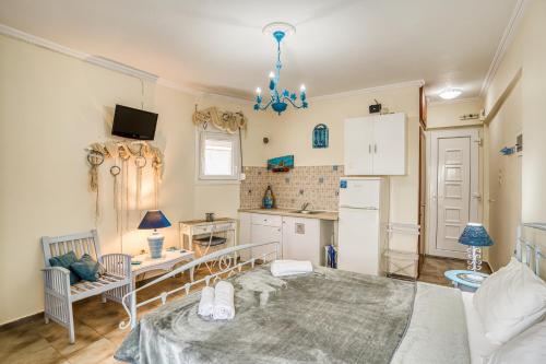 Ένα ή περισσότερα κρεβάτια σε δωμάτιο στο Sun Rooms