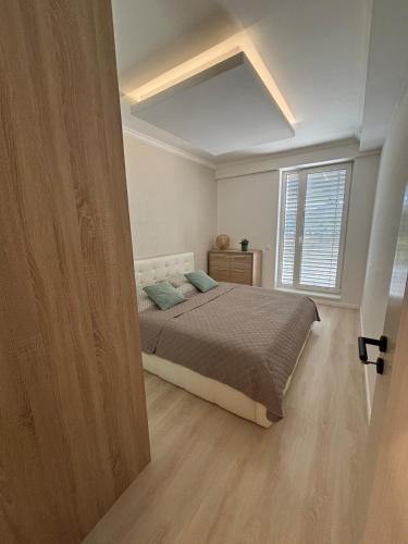 Ένα ή περισσότερα κρεβάτια σε δωμάτιο στο Apartmán Zelené Atrium Premium