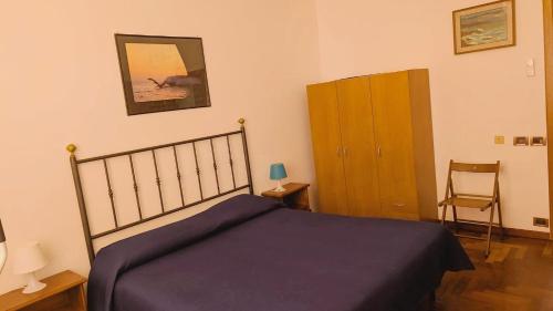 Posteľ alebo postele v izbe v ubytovaní Termini Colosseum apartment