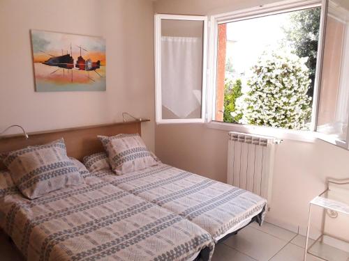 Postel nebo postele na pokoji v ubytování Villa Madura - Classée 3 étoiles - Confort et bien-être à 2 pas des commodités et de l'Hérault