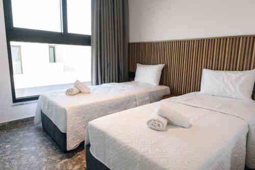 Katil atau katil-katil dalam bilik di Black Diamond Villas Protaras