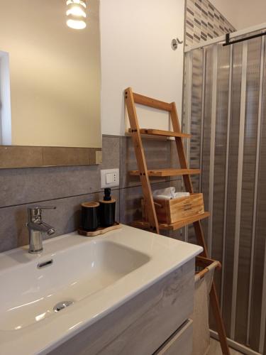 a bathroom with a sink and a shower at Casa vacanza Luna in Eboli