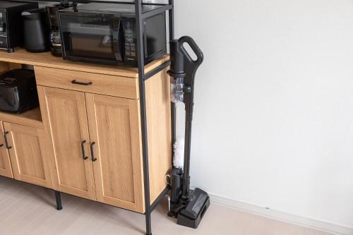 Cuisine ou kitchenette dans l'établissement The SMILE