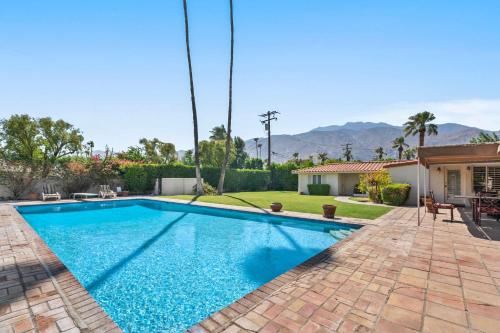 a swimming pool in the backyard of a house at San Jacinto Villa with Private Pool in Palm Springs