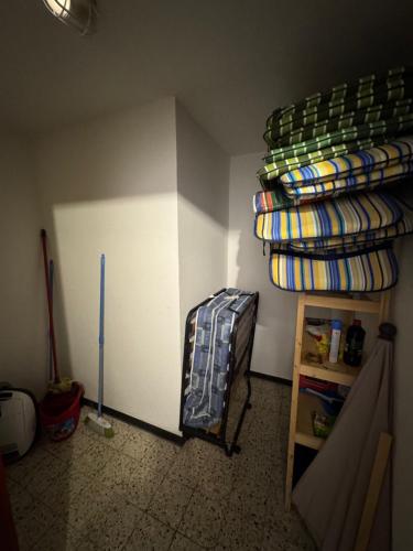 a room with a bunk bed and a book shelf at Hotel Panorama in Wees