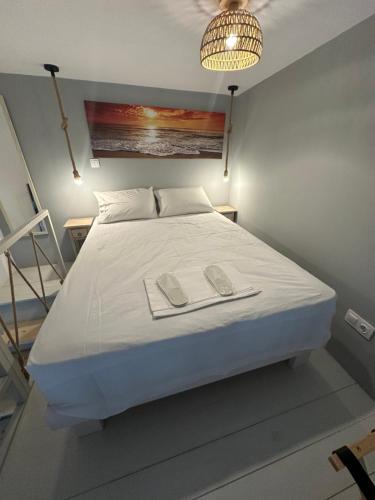 Ένα ή περισσότερα κρεβάτια σε δωμάτιο στο Tinos Inn Apartment