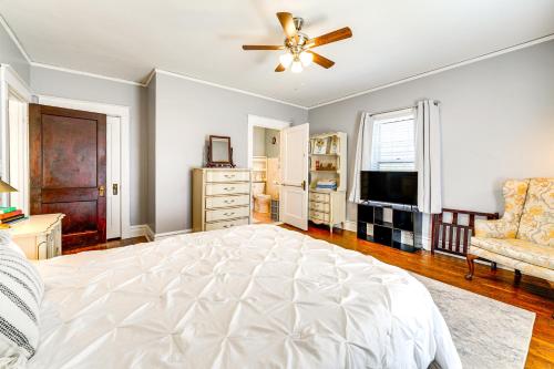 a bedroom with a bed and a ceiling fan at 9 Mi to New River Gorge Spacious Retreat with Porch in Glen Jean