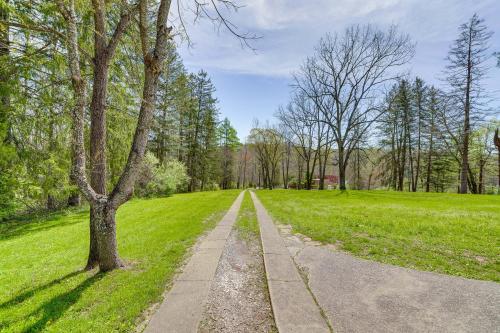 a tree on the side of a road at 9 Mi to New River Gorge Spacious Retreat with Porch in Glen Jean