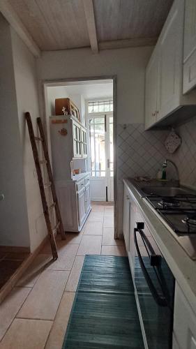 Kuchyň nebo kuchyňský kout v ubytování La Casa di Cesi