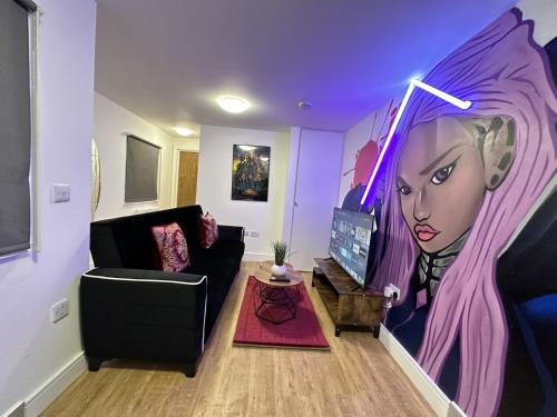 a living room with a large painting of a woman at Peaceful detached home with private outdoor space in Stone Grove