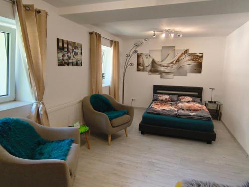 Ένα ή περισσότερα κρεβάτια σε δωμάτιο στο Löwen Haus am Edersee