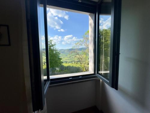 a window in a room with a view at Casita in Radda in Chianti