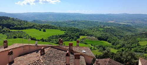 a view from the roof of a house overlooking a valley at La Terrazza sull'Umbria in Collazzone