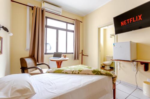 Televisyen dan/atau pusat hiburan di Daher Center Hotel
