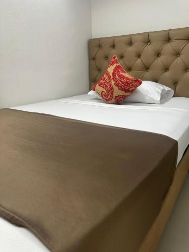 Кровать или кровати в номере Hotel Hernández CTG