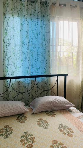 Ein Bett oder Betten in einem Zimmer der Unterkunft Windchime 9