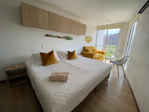 Postel nebo postele na pokoji v ubytování Linda y confortable suite en Santa Marta