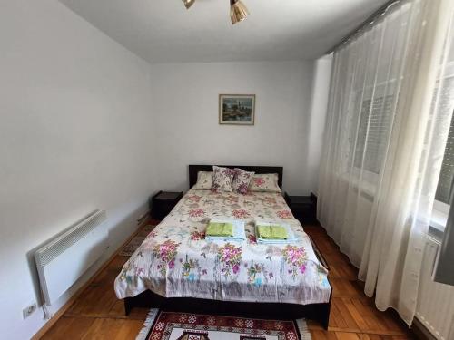 Postel nebo postele na pokoji v ubytování Apartament Alexandra