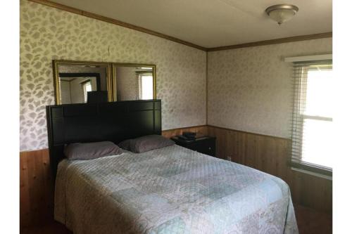 Postel nebo postele na pokoji v ubytování Cadiz Motel by OYO on route 250