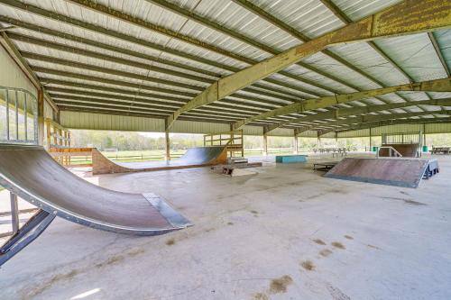 a large building with a skate park with ramps in it at Hike and Fish Marlinton Cabin with Fire Pit and Views! in Marlinton
