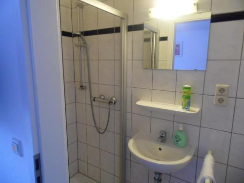 Kylpyhuone majoituspaikassa Hotel Kremer