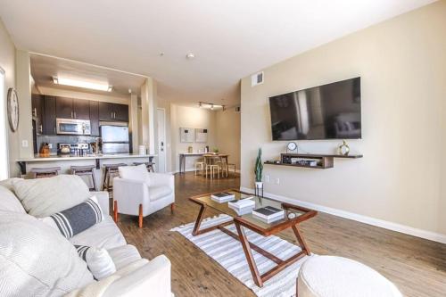 a living room with a couch and a table at Spacious 2BDR Condo near Venice Beach in Los Angeles