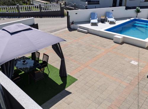 Bazén v ubytování Holiday Home Sea nebo v jeho okolí