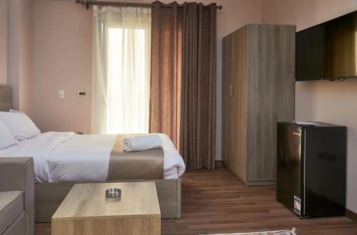 Katil atau katil-katil dalam bilik di Roadhouse New Cairo Residence