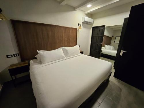 MariaBonita Petit Hotelにあるベッド